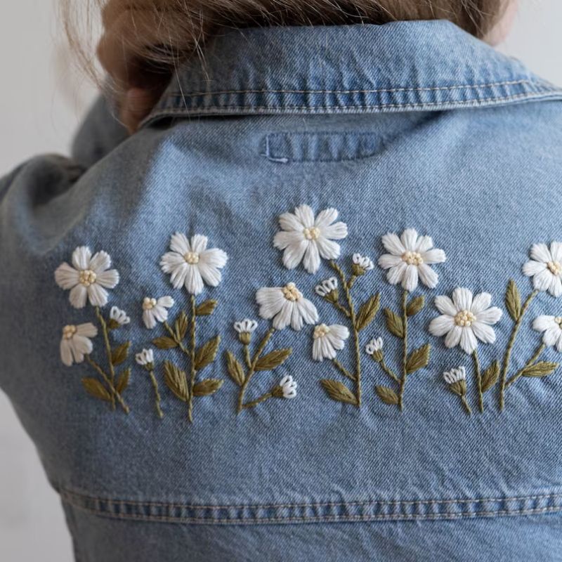 Hand embroidery for mending: Floral embroidery pattern for jeans jacket by Why Not Stitching