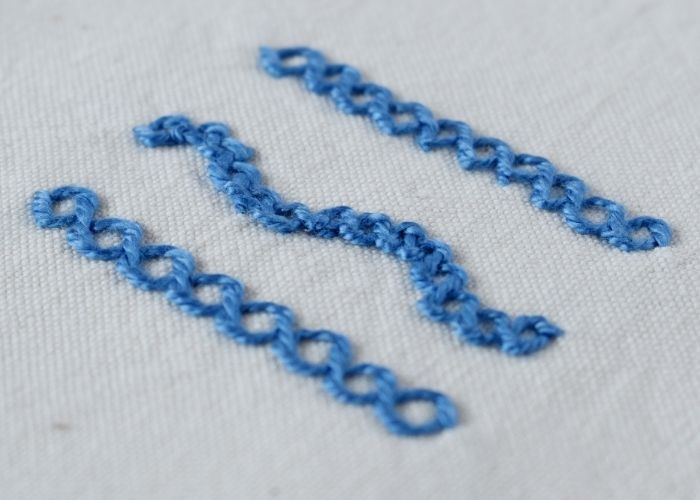 Knotted Chain Stitch embroidery with blue pearl cotton thread